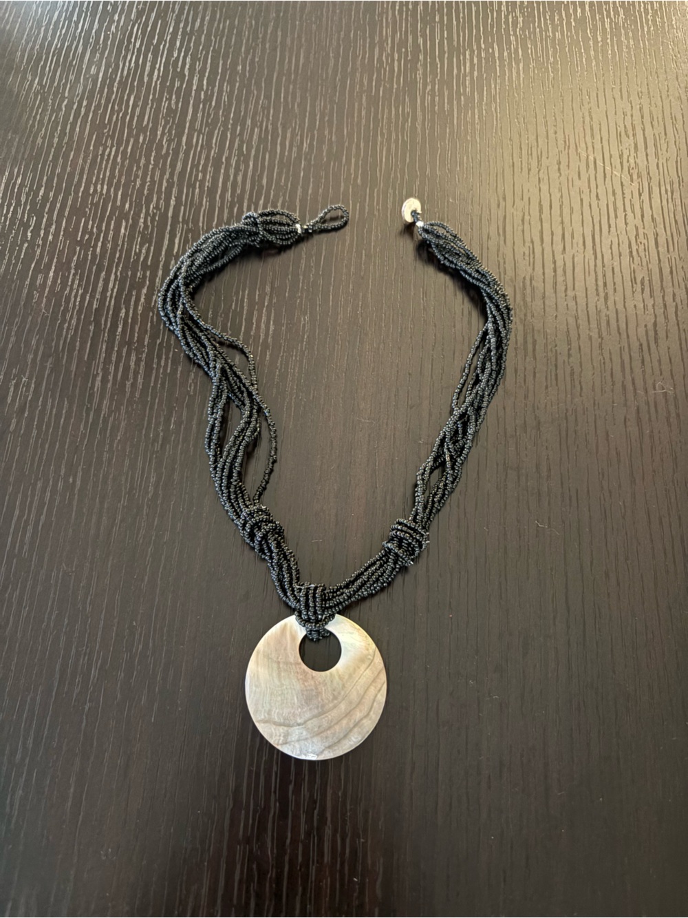 Handcrafted Black Beaded Necklace with Silver Abalone Pendant